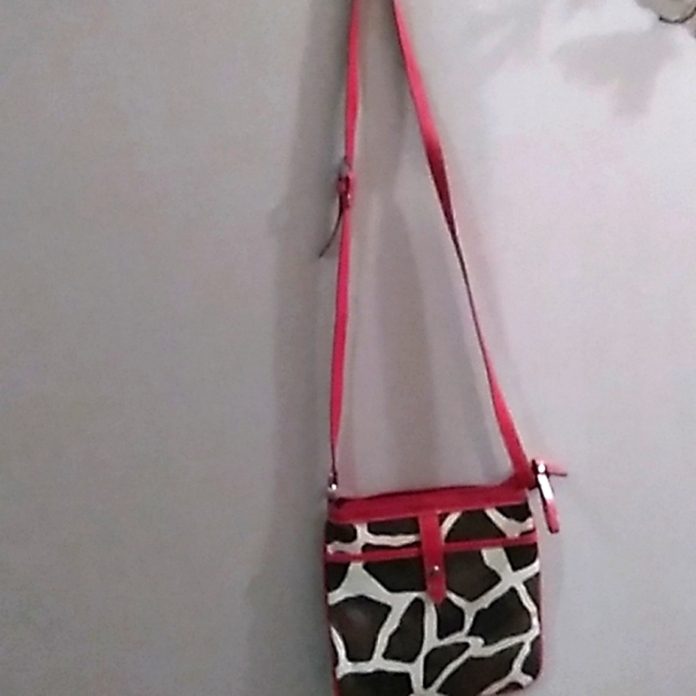 Handbag.  One pocket in the back and the front.  3 pockets inside